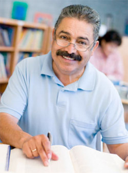 Picture of adult learner reading book