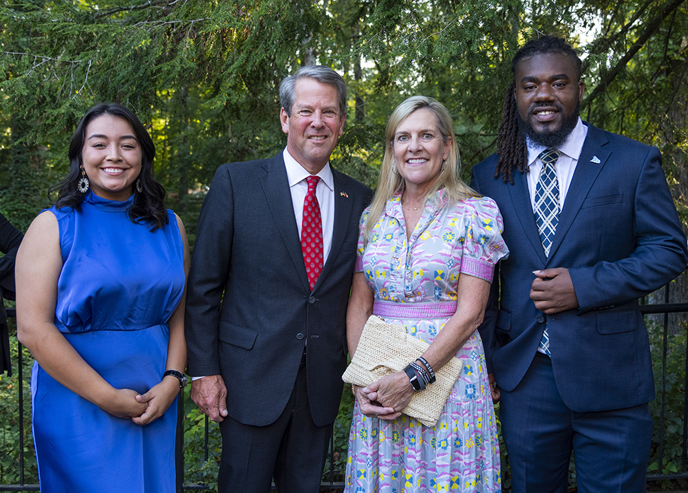 From left, Dalton State College graduate and current University of Georgia student Jennifer Granados, Gov. Brian Kemp, First Lady Marty Kemp and College of Coastal Georgia student Jovan Mills. Granados and Mills are each recipients of scholarships funded in part through the USG Foundation.