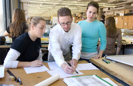 High School teacher with students